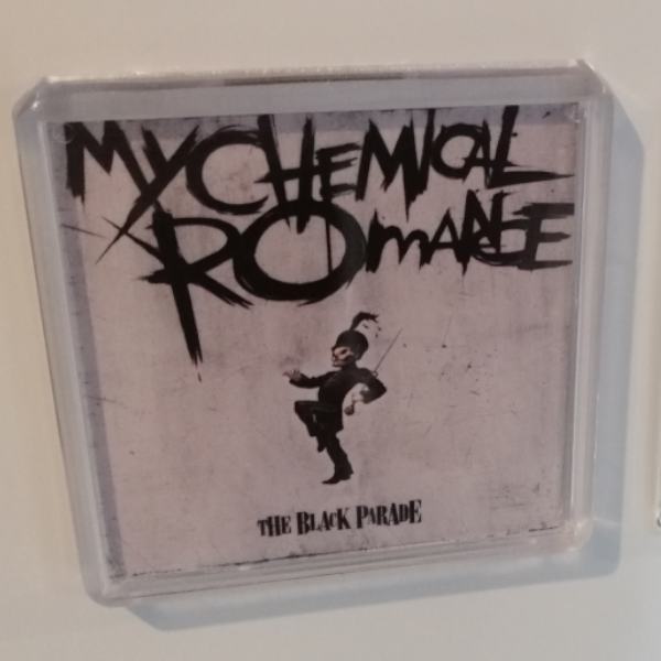 An image of The Black Parade by My Chemical Romance as a fridge magnet displayed on a white fridge