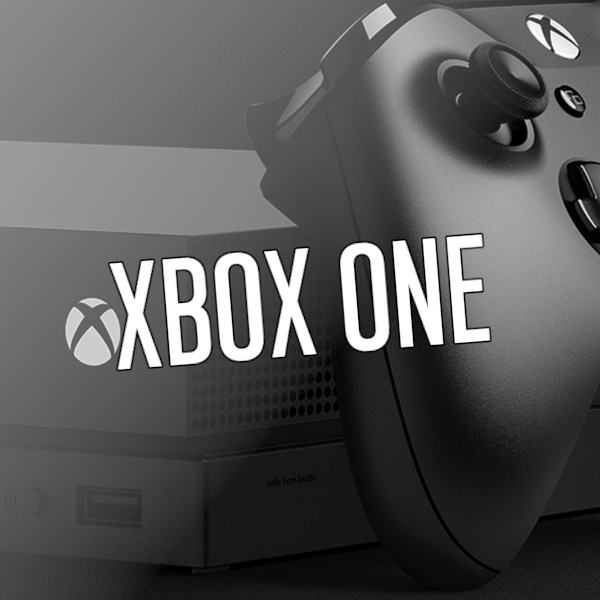 Close up of an Xbox One X console and controller, with the word Xbox One over the top