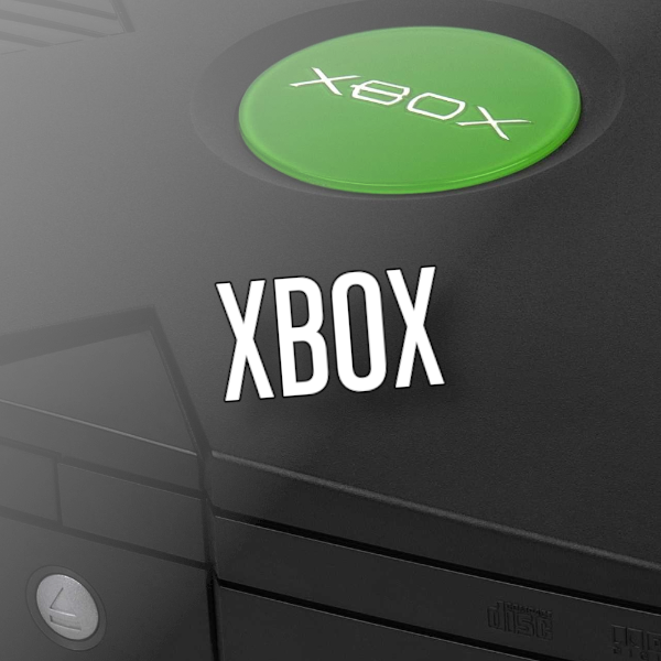 Image of an original Xbox console with the word Xbox over the top