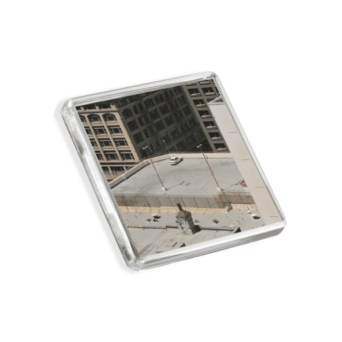 Image of Arctic Moneys The Car album cover-inspired fridge magnet on a white background