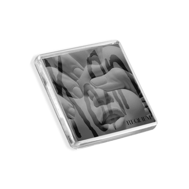 Image of Korn - Requiem album cover-inspired fridge magnet on a white background