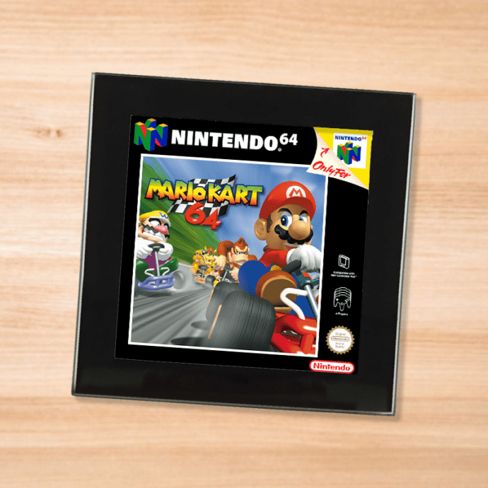 Black glass Mario Kart 64 coaster on a wood table