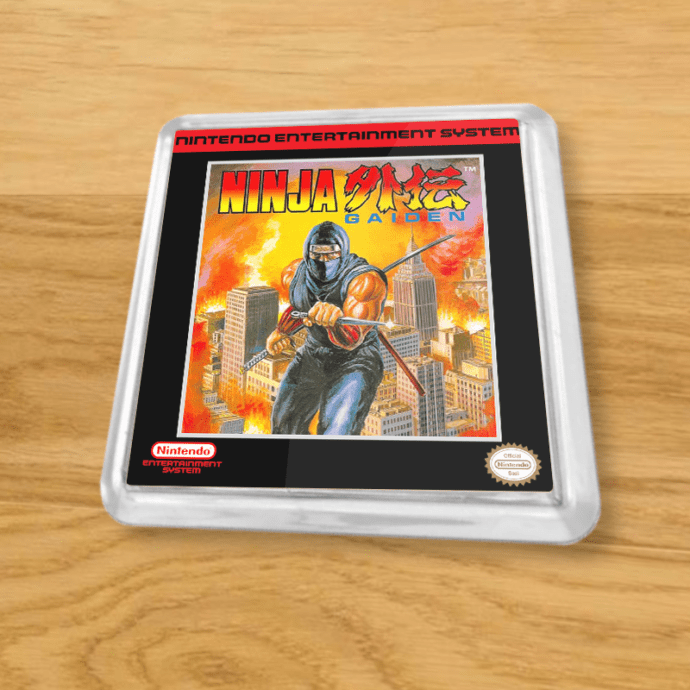 Plastic Ninja Gaiden coaster on a wood table
