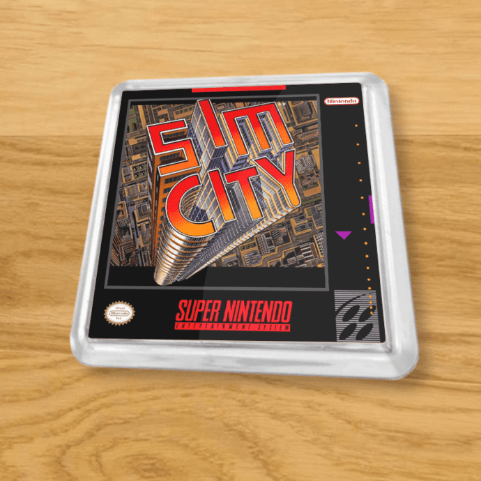 Plastic Sim City coaster on a wood table