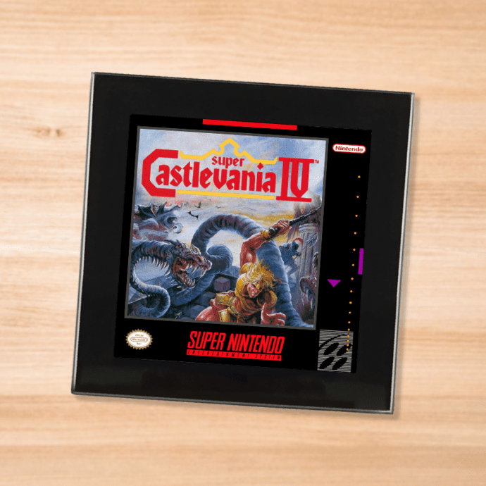 Black glass Super Castlevania 4 coaster on a wood table