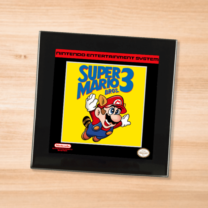 Black glass Super Mario Bros 3 coaster on a wood table