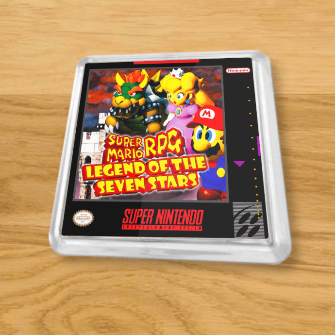 Plastic Super Mario RPG coaster on a wood table