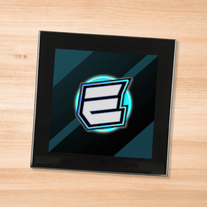 Black glass EternalLeeHD - logo coaster on a wood table