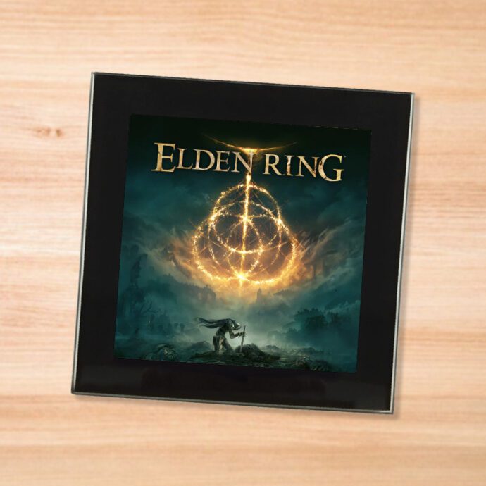 Black glass Elden Ring coaster on a wood table