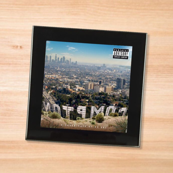 Black glass Dr. Dre - Compton coaster on a wood table