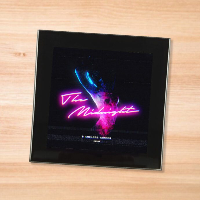 Black glass Midnight - Endless Summer coaster on a wood table