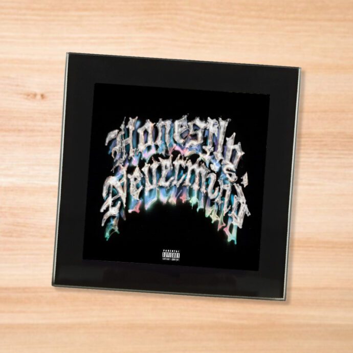 Black glass Drake - Honestly Nevermind coaster on a wood table