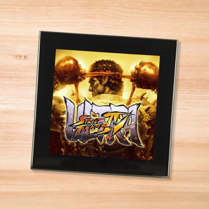 Black glass Street Fighter 4 coaster on a wood table