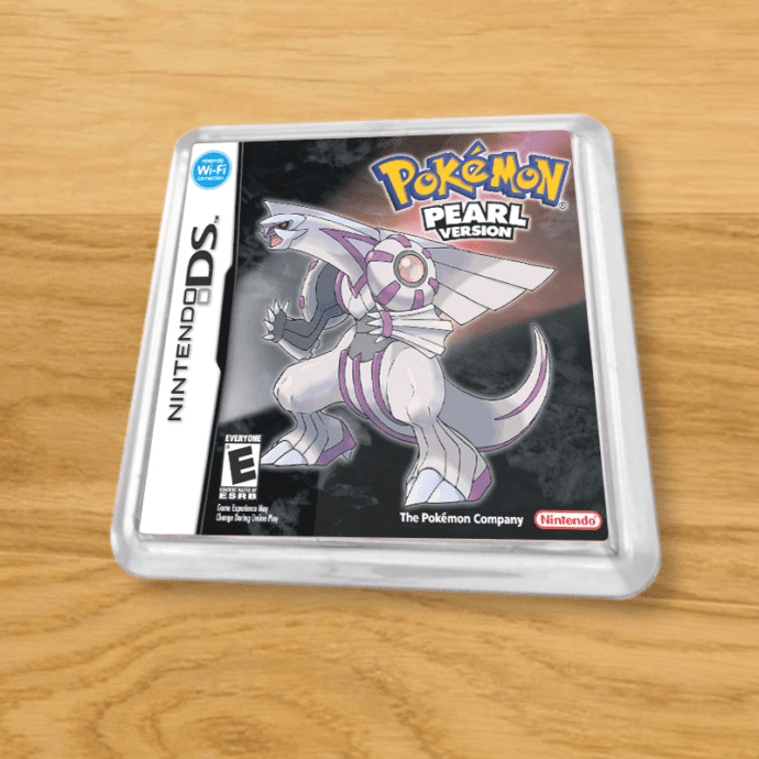 Pokemon Pearl plastic coaster on a wood table