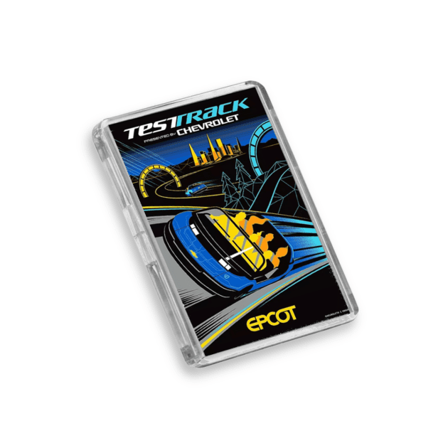 Plastic Test Track Disney World fridge magnet on a white background