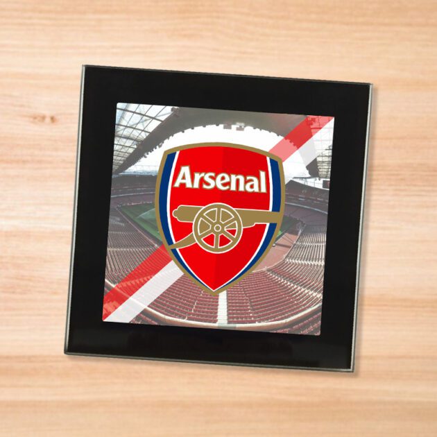 Arsenal drinks coaster on a wooden table