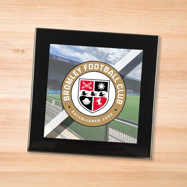 Bromley drinks coaster on a wooden table