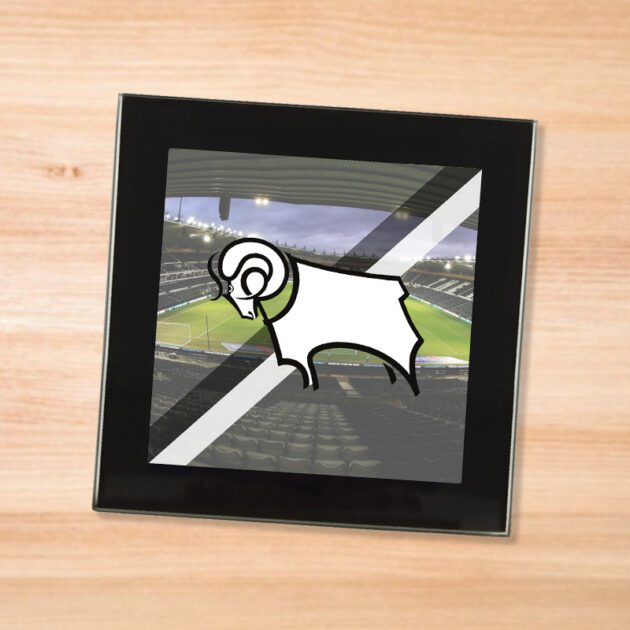 Derby County drinks coaster on a wooden table
