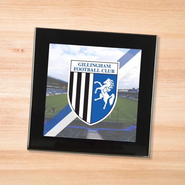 Gillingham drinks coaster on a wooden table