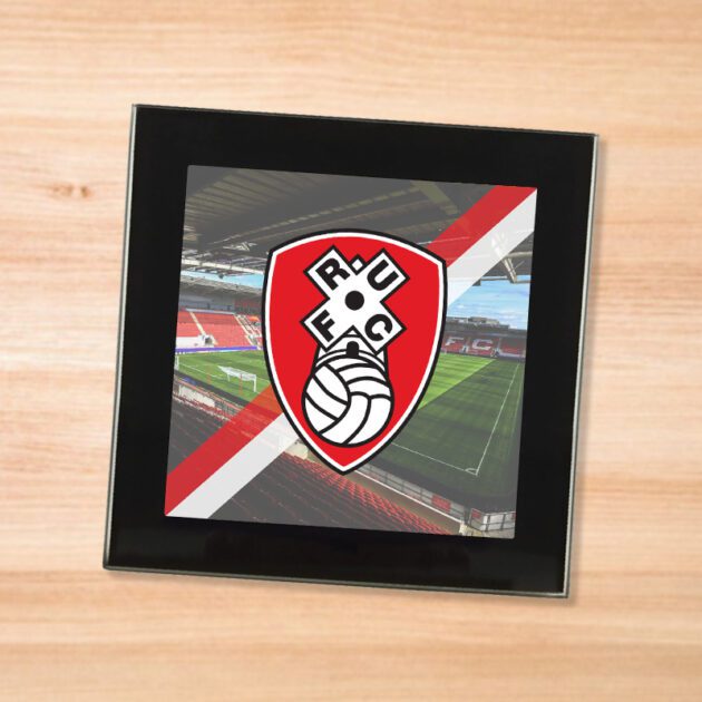 Rotherham United drinks coaster on a wooden table