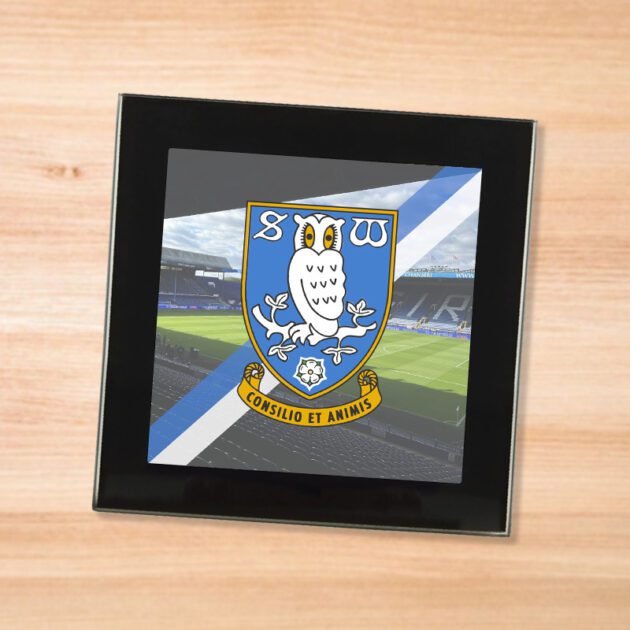 Sheffield Wednesday drinks coaster on a wooden table