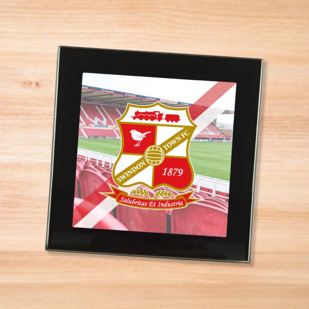 Swindon Town drinks coaster on a wooden table