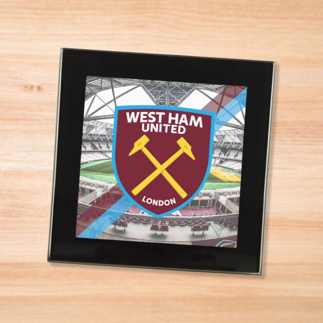 West Ham United drinks coaster on a wooden table